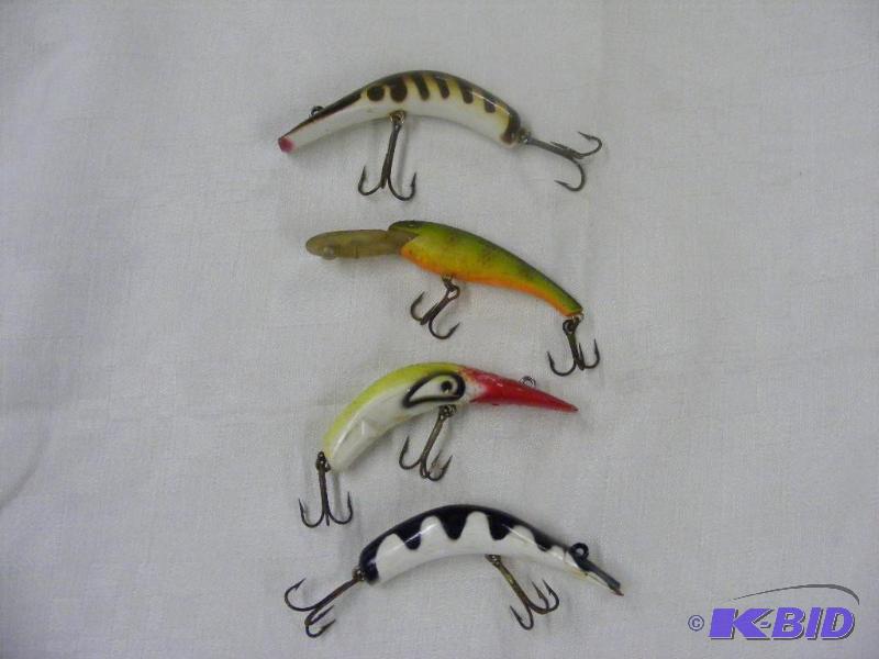 Four Lures, two are labeled Kaotzky Lazy Ike ...
