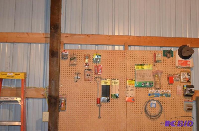 lot 120 image: Group new and used tools and parts on back ga...