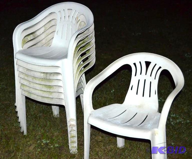 lot 135 image: Group of whit stacking lawn or patio chairs. ...