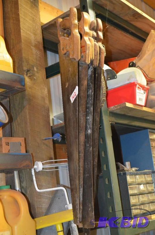 lot 142 image: 5 hand saws with wood handles...