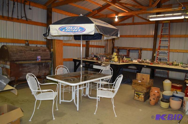 lot 5 image: Vintage Outdoor Glass Table with Vintage Bud ...