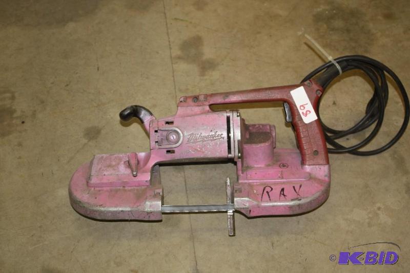 lot 89 image: Purple Milwaukee Portable Band Saw...