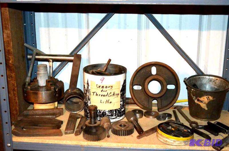 lot 9 image: Lathe chuck and other tools & gears for t...