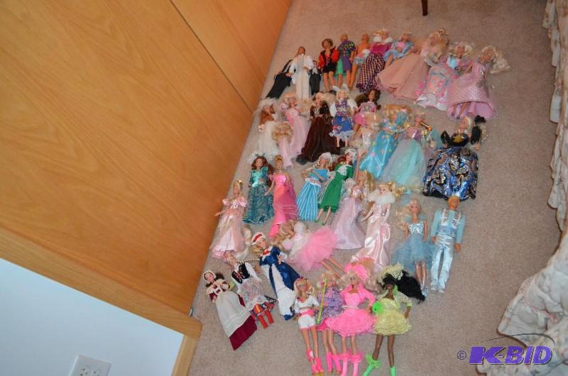 lot 152 image: Lot of over 30 Barbie dolls including 1966 an...