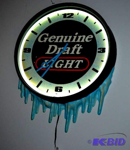lot 178 image: Miller Genuine Draft Light Beer Neon clock wi...