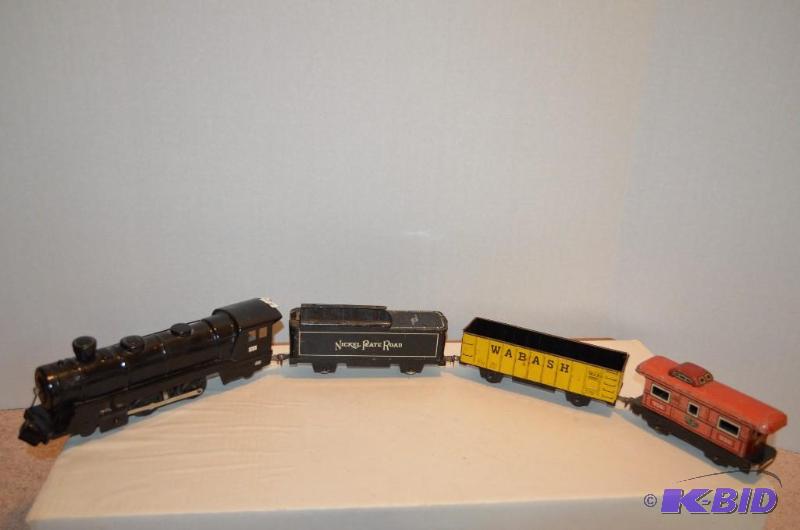 lot 20 image: Lot of Marx trains- Engine, tender, car, and ...