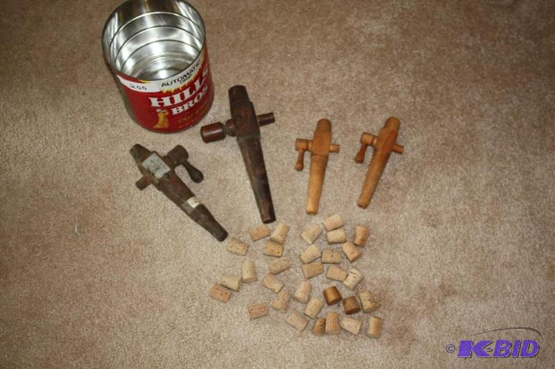 lot 200 image: Antique collection of wooden spigots 1 says ...