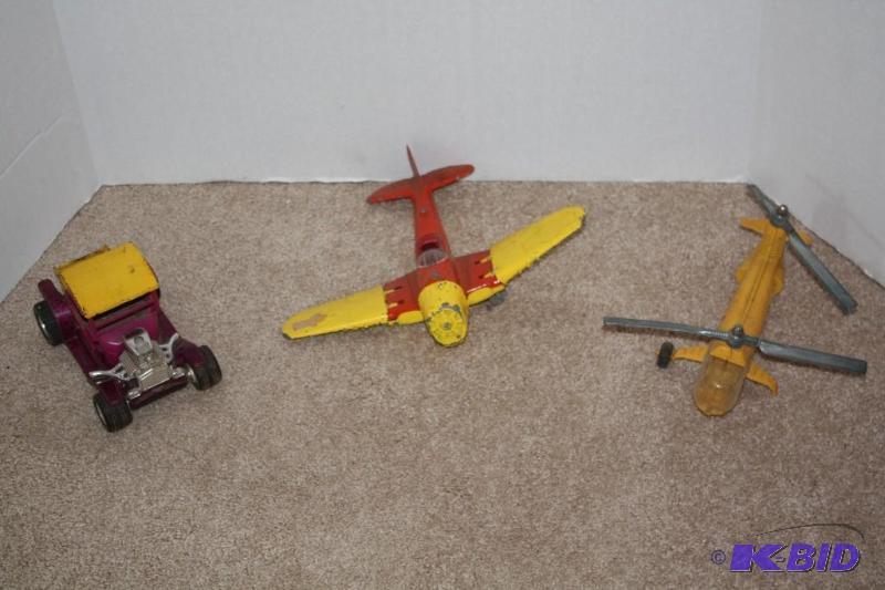lot 201 image: Antique plane, helicopter and car. Car Tonka...
