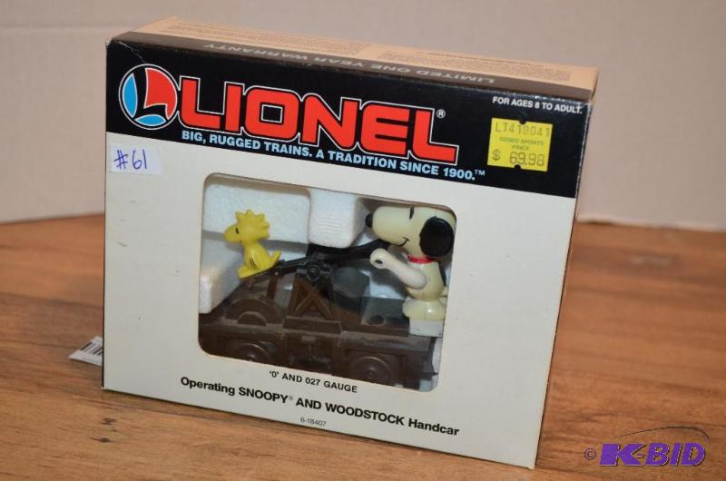lot 61 image: Lionel operating Snoopy & Woodstock handc...