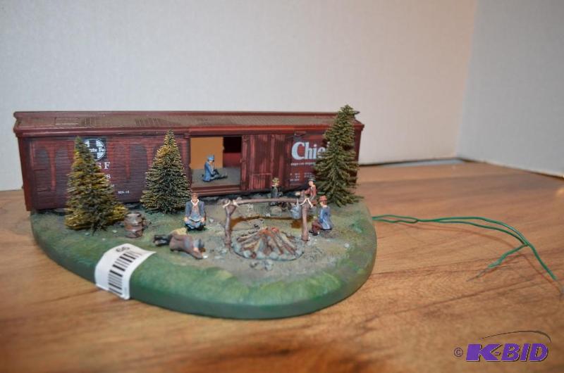 lot 66 image: Lionel display Hobo Hotel by campfire. Santa ...