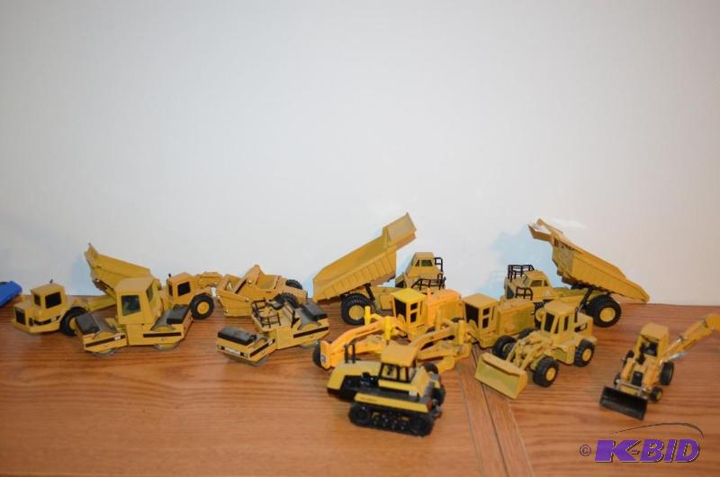lot 84 image: Lot of Caterpillar tractors and dumpsters. Nu...
