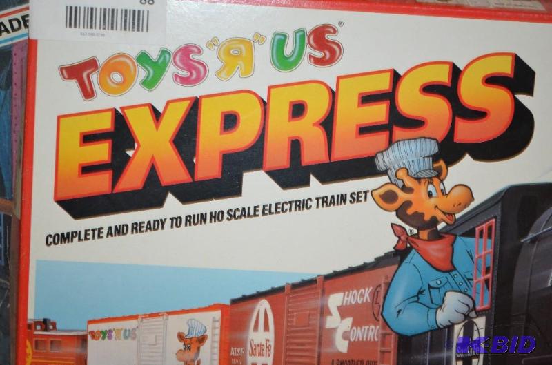 lot 88 image: Toys R Us Express with engine, box car, littl...