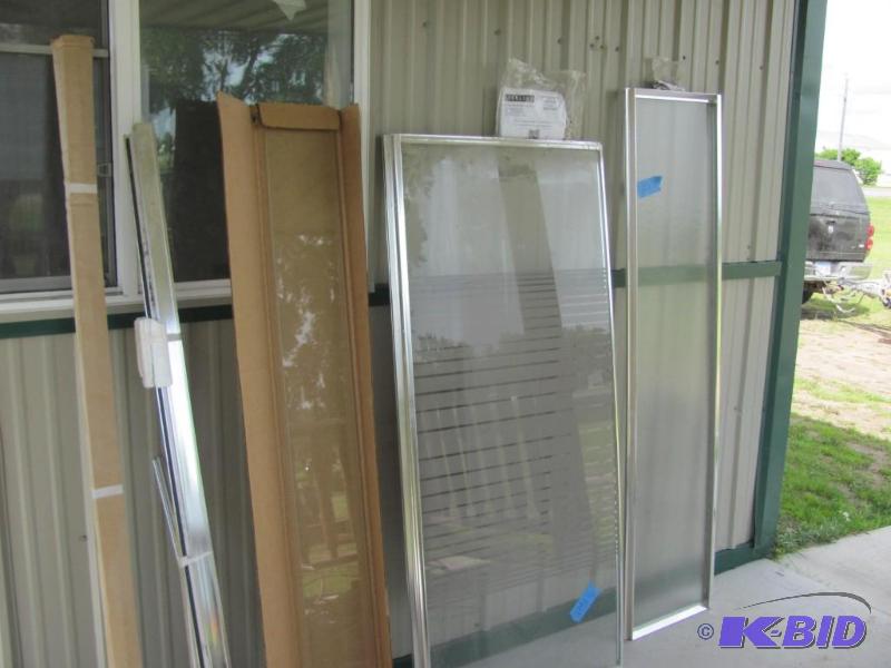 misc shower and tub doors with some metal rai...