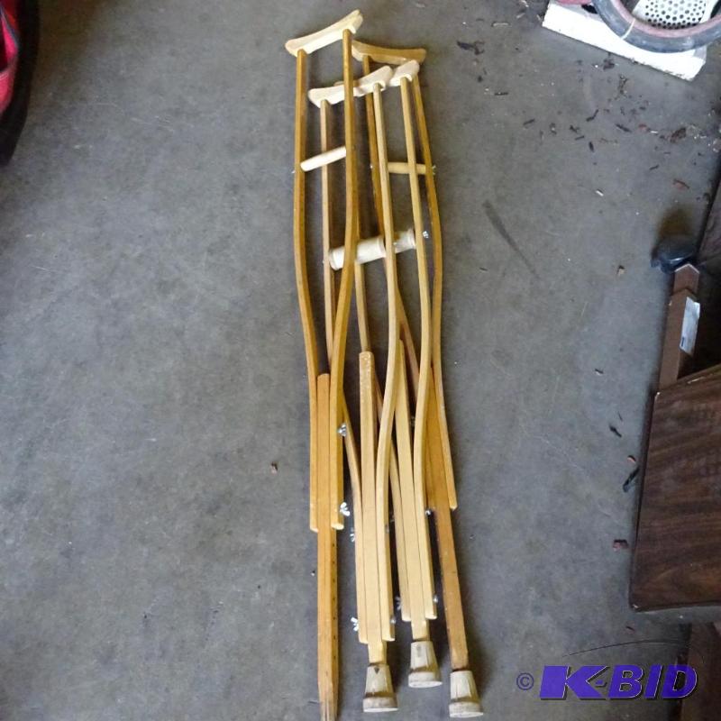 lot 136 image: 2 sets of wood crutches...