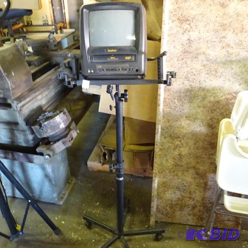 lot 160 image: Adjustable Height TV Stand with 12 Volt Symho...
