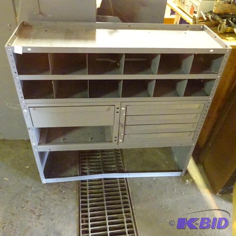 lot 18 image: Work van metal storage unit. 37 x 12 x 36...