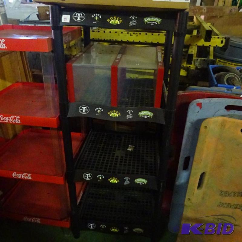 lot 185 image: Plastic liquor 4 tier retail stand...