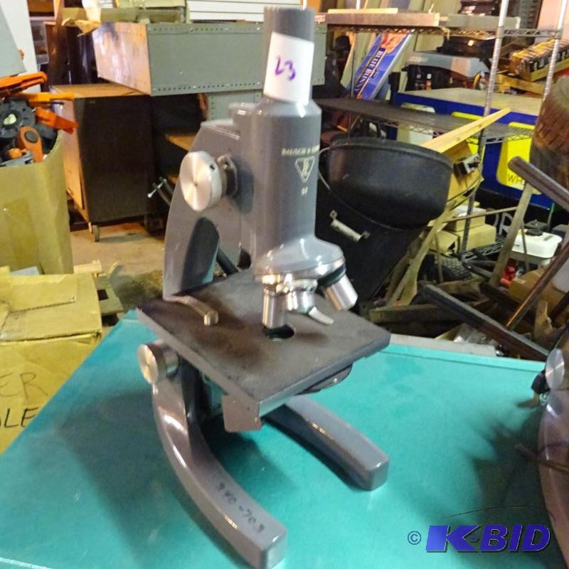 lot 23 image: Bausch and Lomb ST microscope. Missing eye pi...