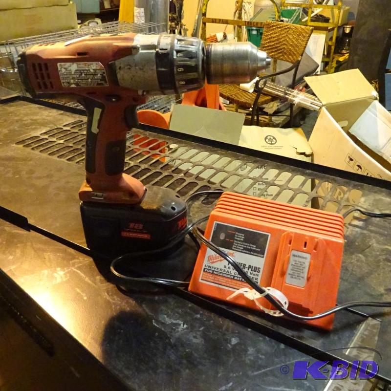 lot 29 image: 18 volt Milwaukee drill and charger. Works...