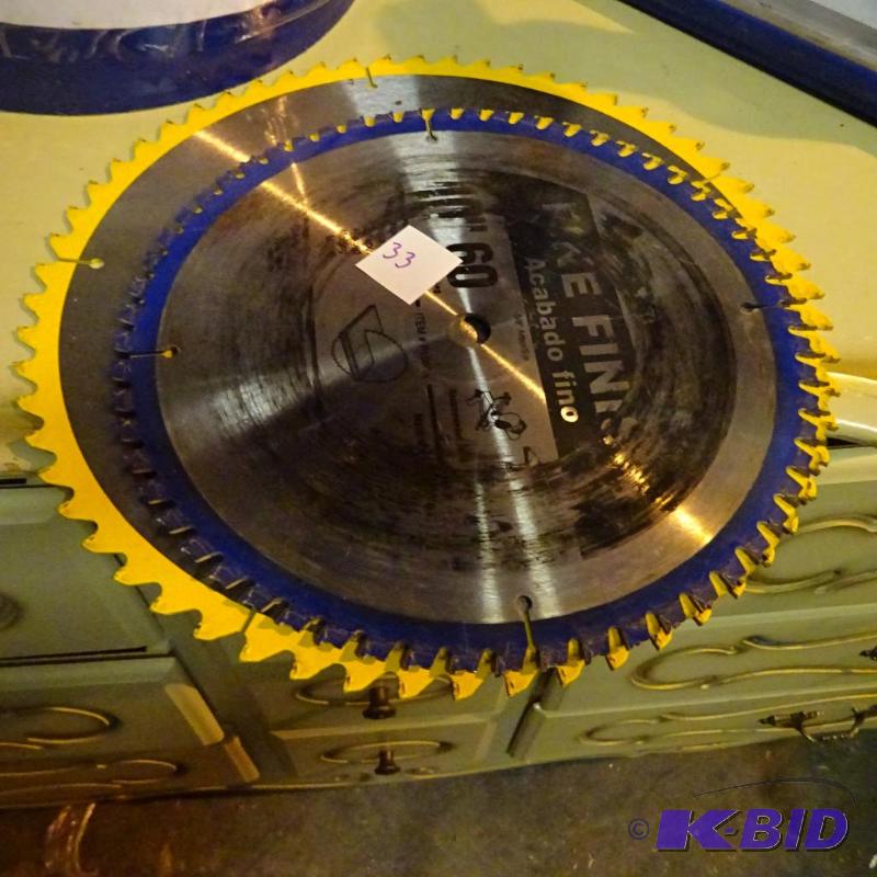lot 33 image: New 12" Dewalt saw blade. 10" used ...