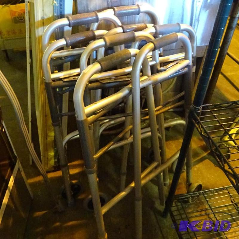 lot 57 image: 4 aluminum fold up walkers...