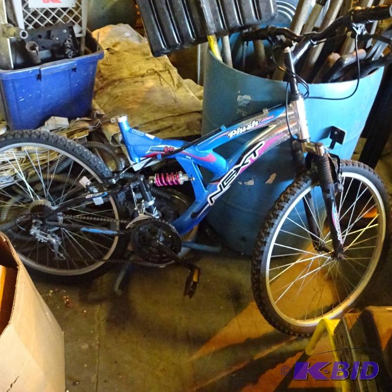 lot 62 image: Next plush aluminum frame bike. No seat. 21 s...
