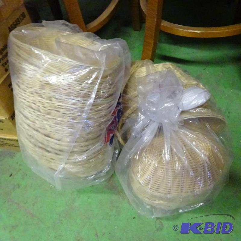 lot 74 image: 38 woven bread baskets...