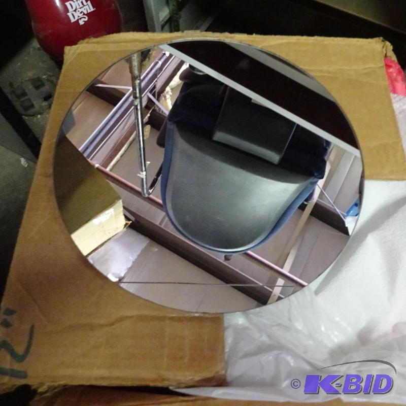 lot 88 image: 12" round mirrors. Qty 24...