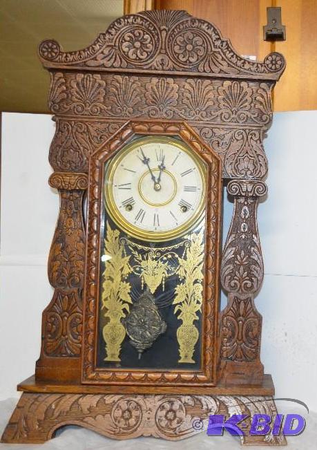 lot 11 image: Antique Wood Gingerbread&nbspClock by Wm. L....
