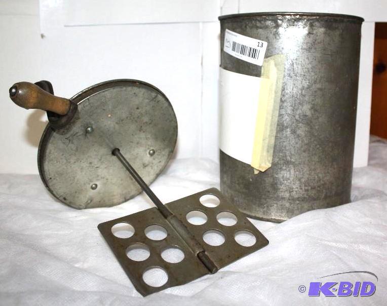 lot 13 image: Antique Butter Maker Churn, metal round. Numb...
