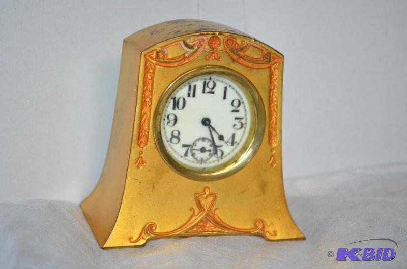 lot 15 image: Antique early 1900s Gold colored clock with ...