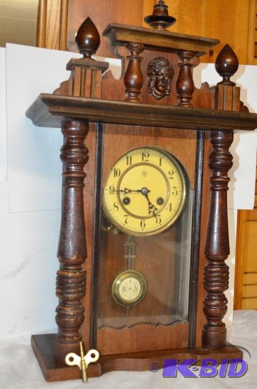 lot 38 image: Antique wood clock by Junghans. R & A on ...