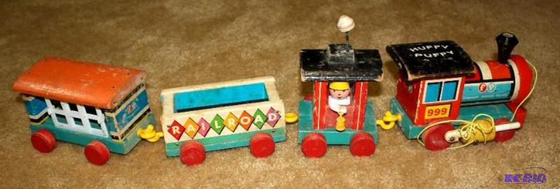 lot 40 image: Vintage Fisher Price Pull Train. Huffy Puffy,...