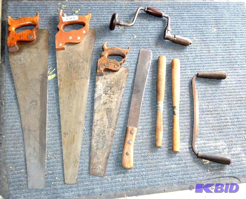 lot 75 image: Tools   3 hand saws, 2 with carved wood handl...