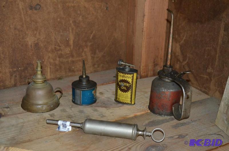 lot 81 image: lot of oilkerosene cans   Looks like the bas...
