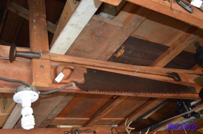 lot 83 image: Antique rip saw with wood handle and 42 inc...