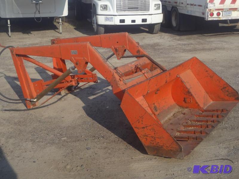 Hydraulic Tractor Loader With Spring-Trip Buc...
