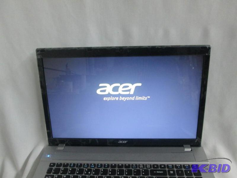 lot 1 image: Acer Aspire 17.3 4GB Windows 8 Laptop