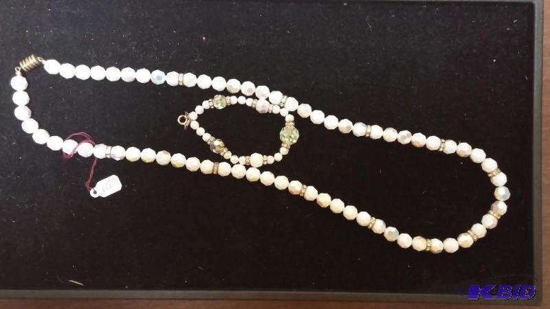 1992 White beaded necklace with bracelet...