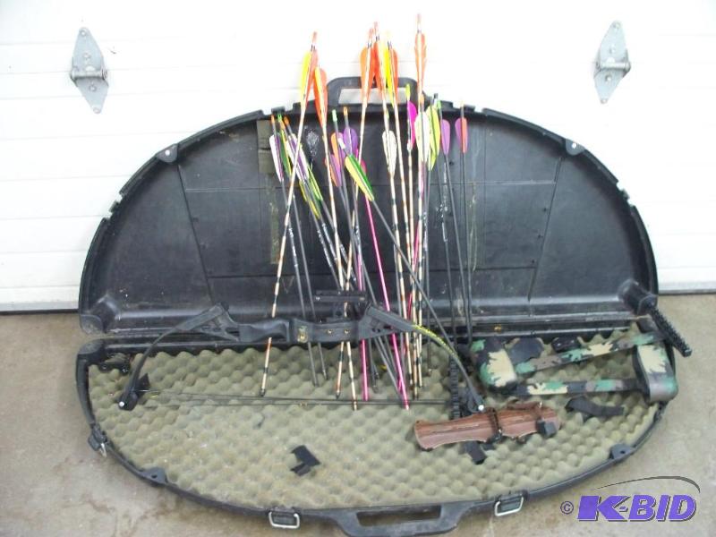 Hard case for bow with a bunch of arrows and ...