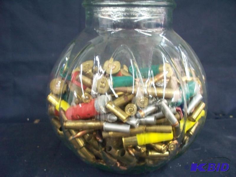 Big jar of bullets (357 shells, 30-06 shells,...