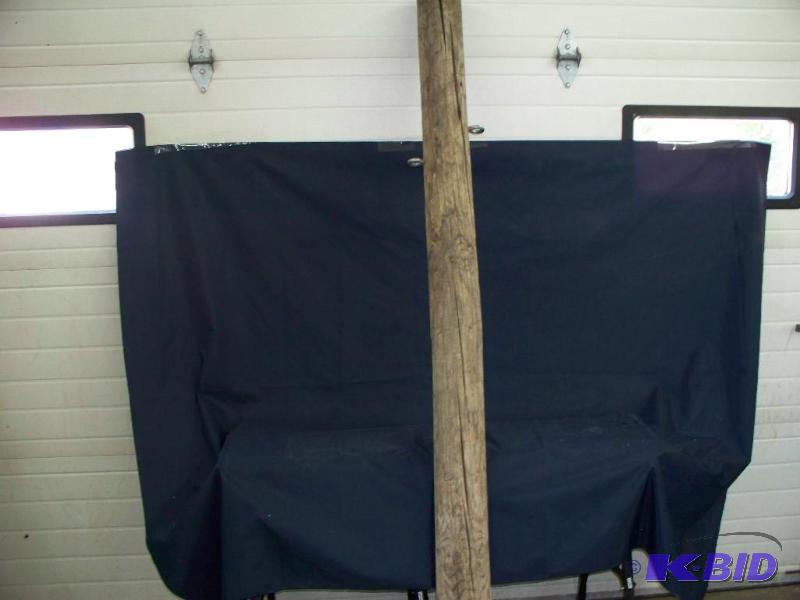 1 green treated pole 7ft long 5in wide...