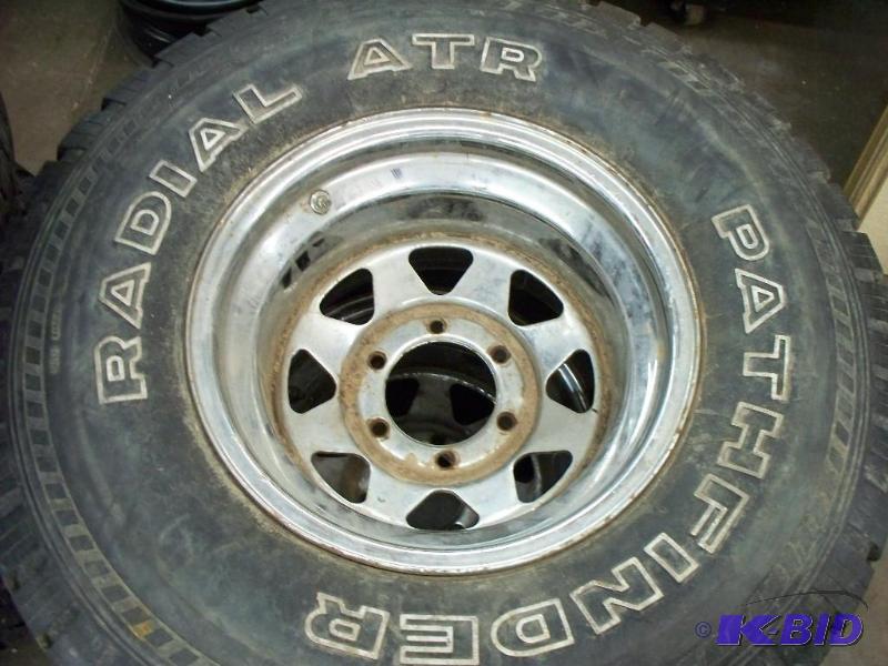 2 tires and rims 33x12.50x15...