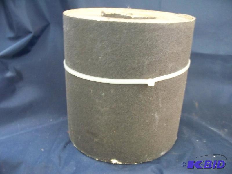 A big roll of roll-o-grit sandpaper by norton...
