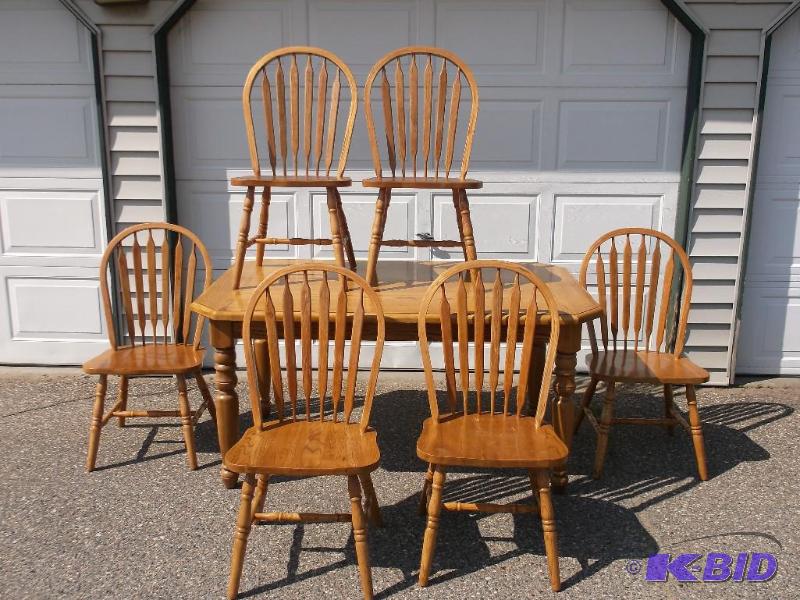 lot 1 image: Beautiful solid oak dining room table with 6 ...