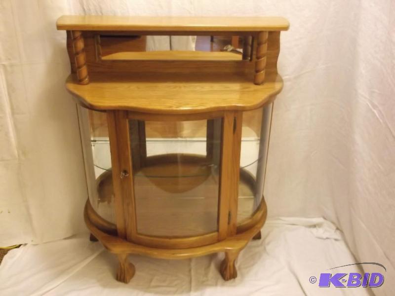 lot 2 image: Beautiful curved glass solid oak claw foot li...