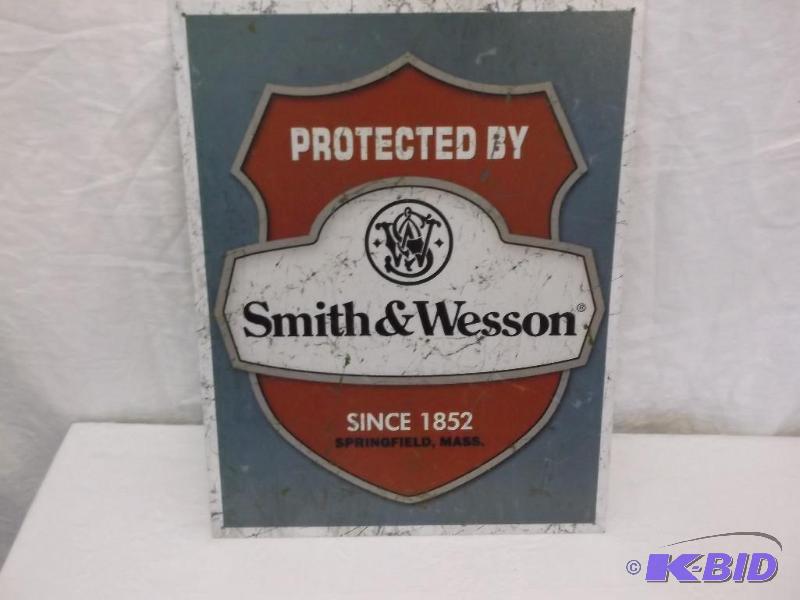 lot 35 image: Collectable Smith & Wesson metal sign mea...