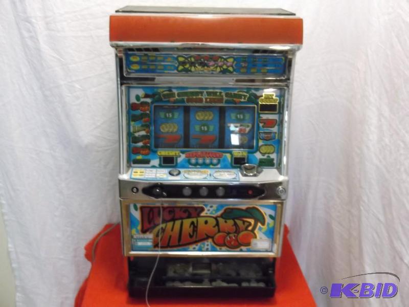 lot 40 image: Lucky Cherry token slot machine comes with ke...