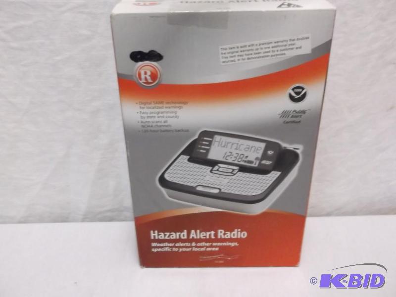 lot 48 image: Radio Shack hazard alert radio appears new in...