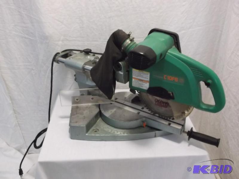 lot 50 image: HITACHI 10" slide compound saw powers up...